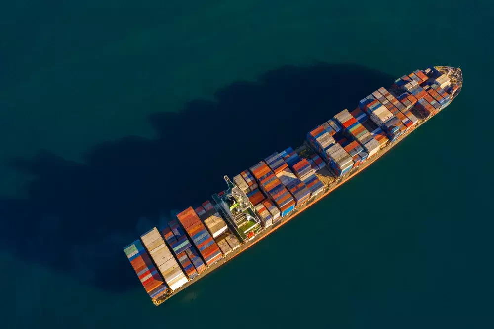 Container ship carrying vehicles overseas
